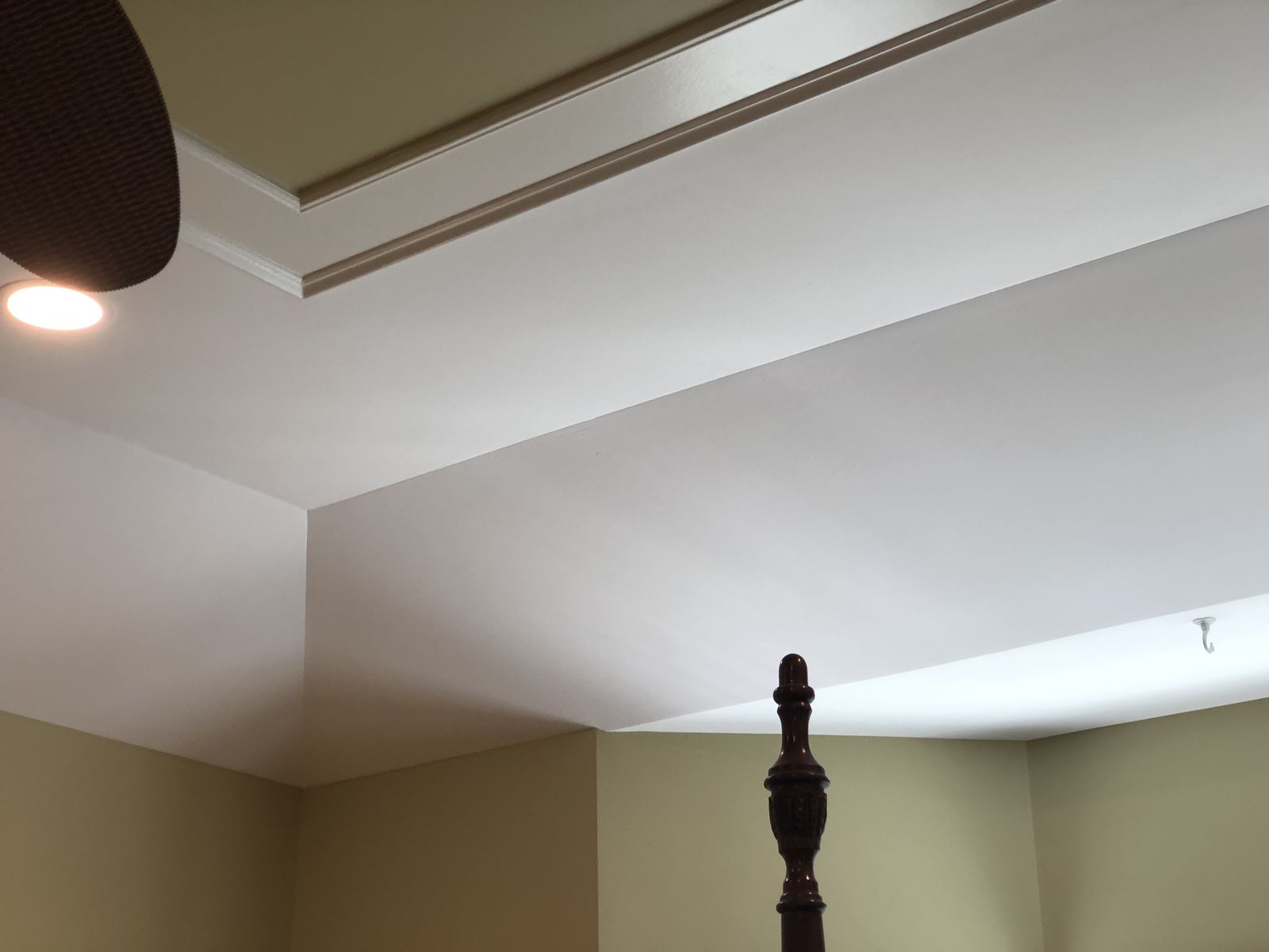 Ceiling and crown molding detail after painting