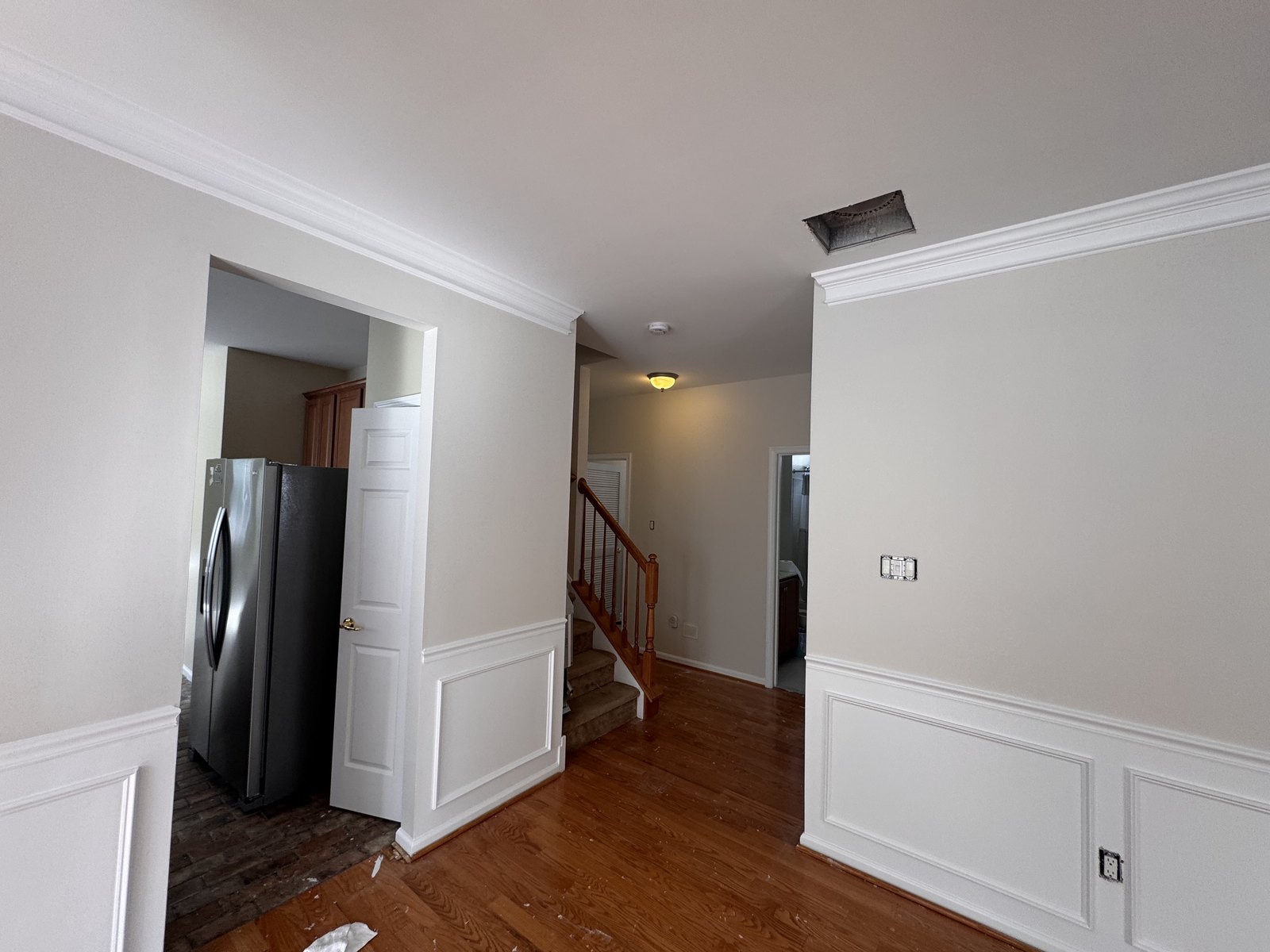 Entry hall and wainscoting in the Newtown, PA whole house painting project