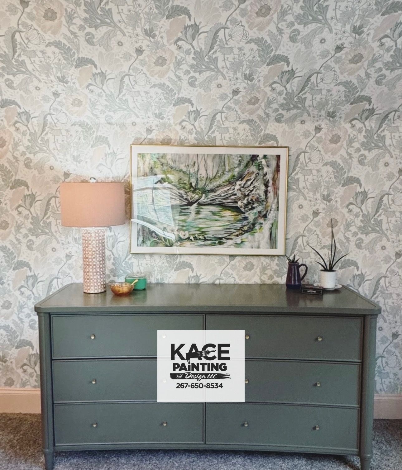 Bedroom with botanical wallpaper behind a painted dresser
